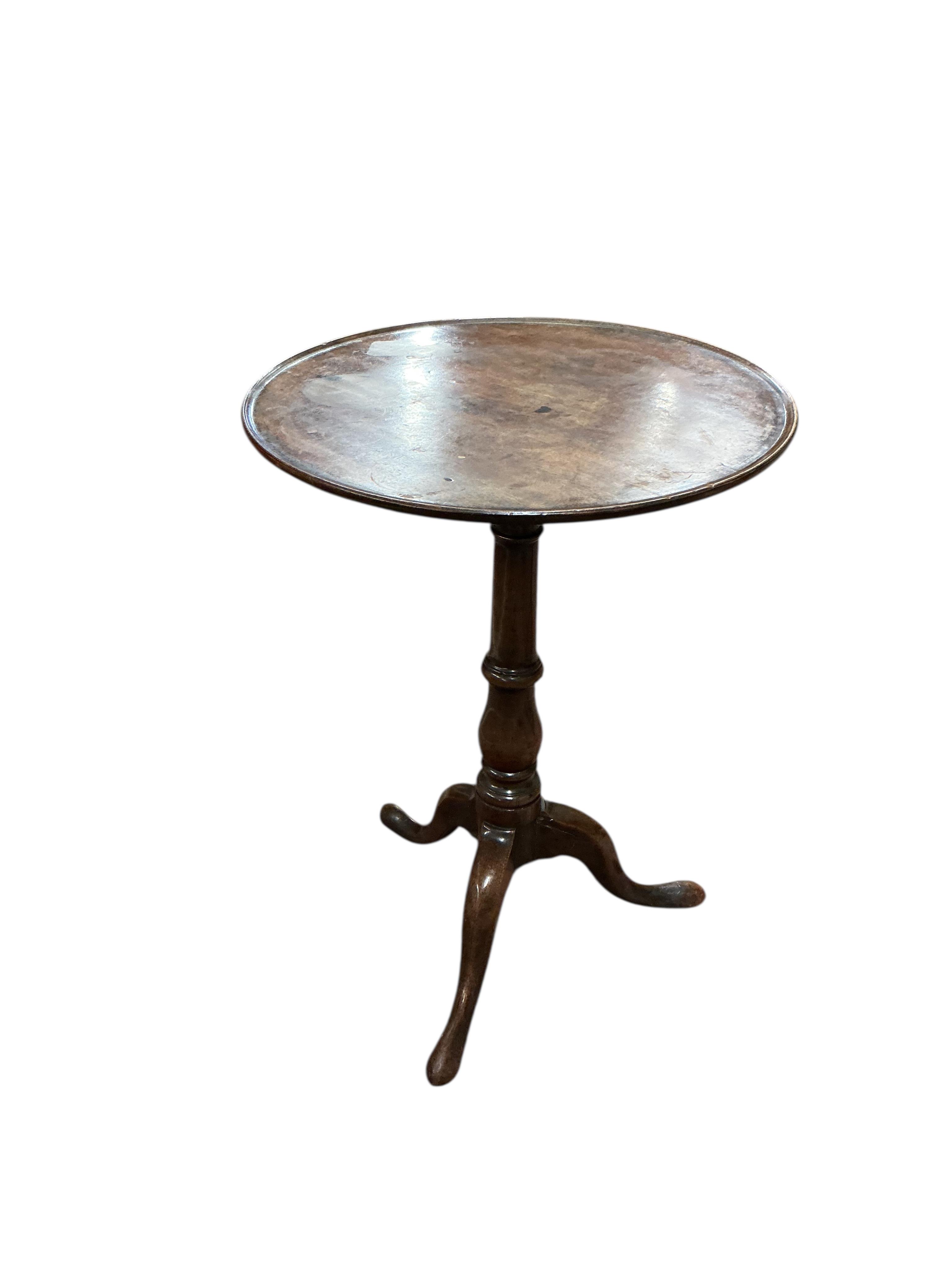 Two early 19th century circular mahogany tripod wine tables, larger diameter 50cm, height 69cm